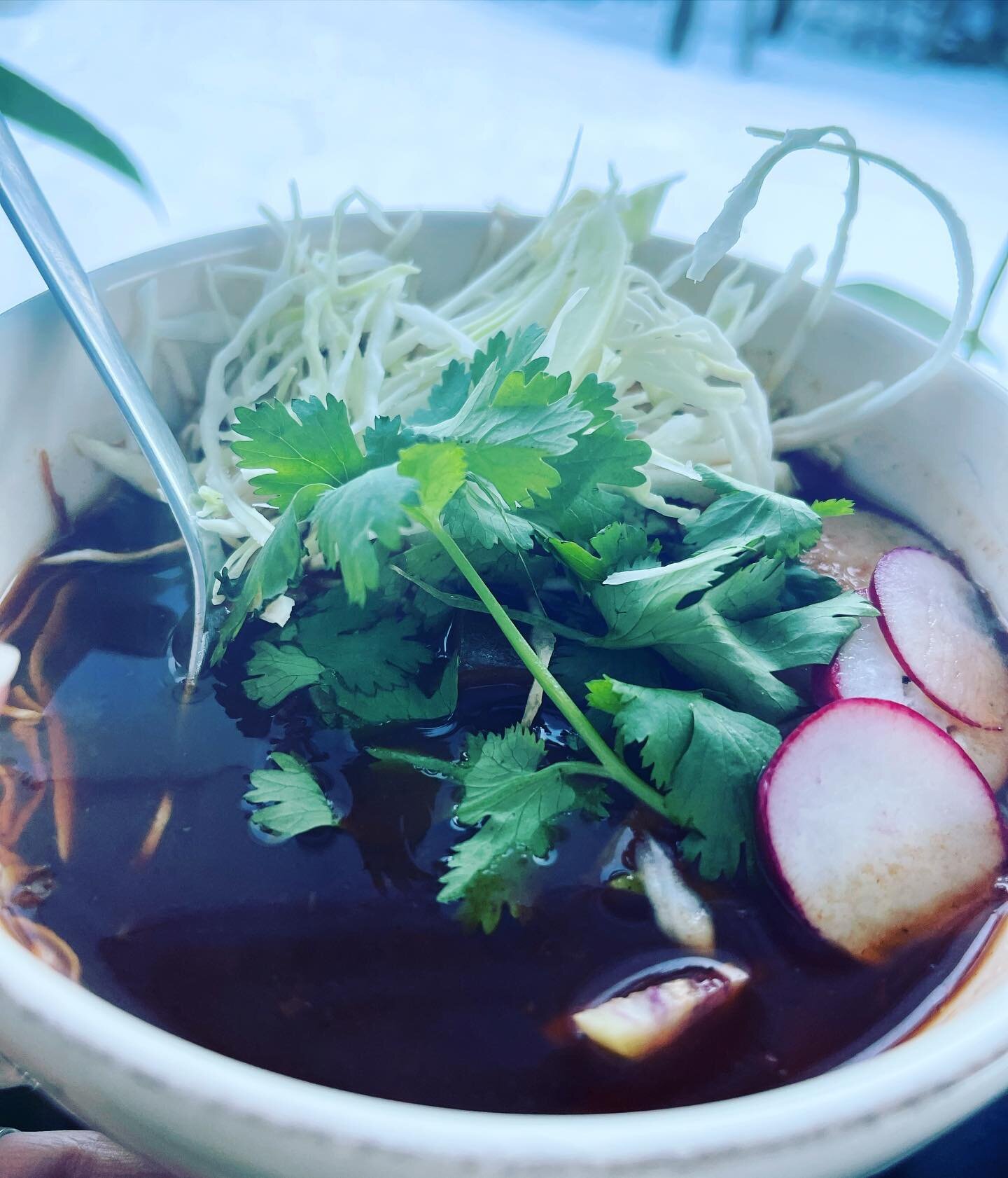�9�2Spicy Pozole Rojo is our soup of the week. Mushrooms, hominy, zucchini, tomato and garlic all simmer in a spicy pepper broth. Topped with shredded cabbage, cilantro and rasdish. Reve up and warm your metabolism!